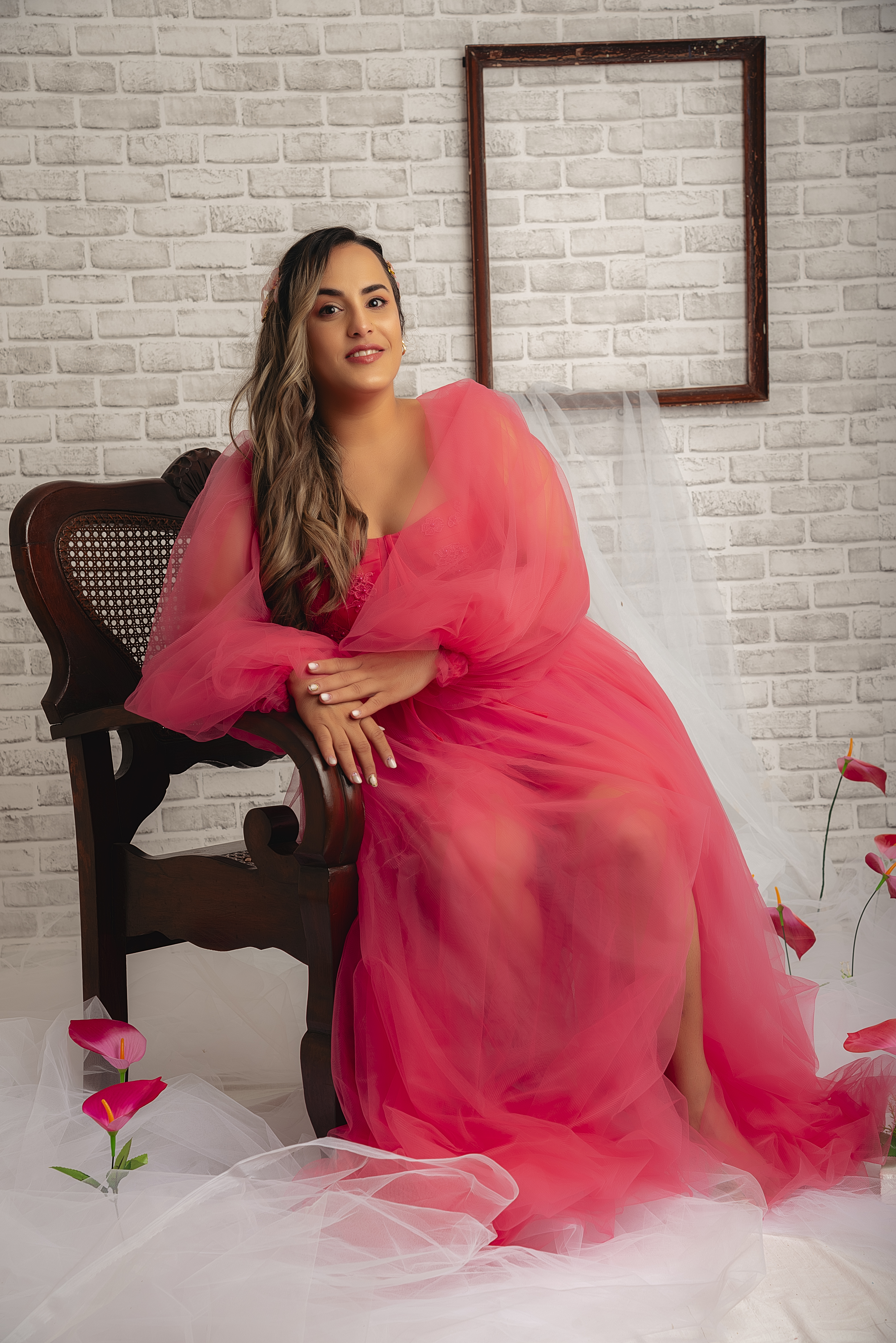 Professional event decorator smiling in a warm setting